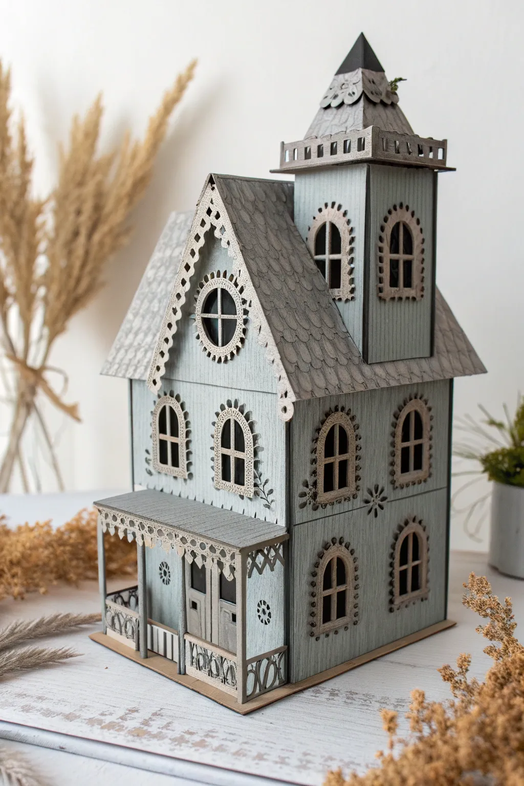 Transform cardboard into a charmingly eerie mini haunted house—perfect for adding a touch of handcrafted magic to your Halloween decor.