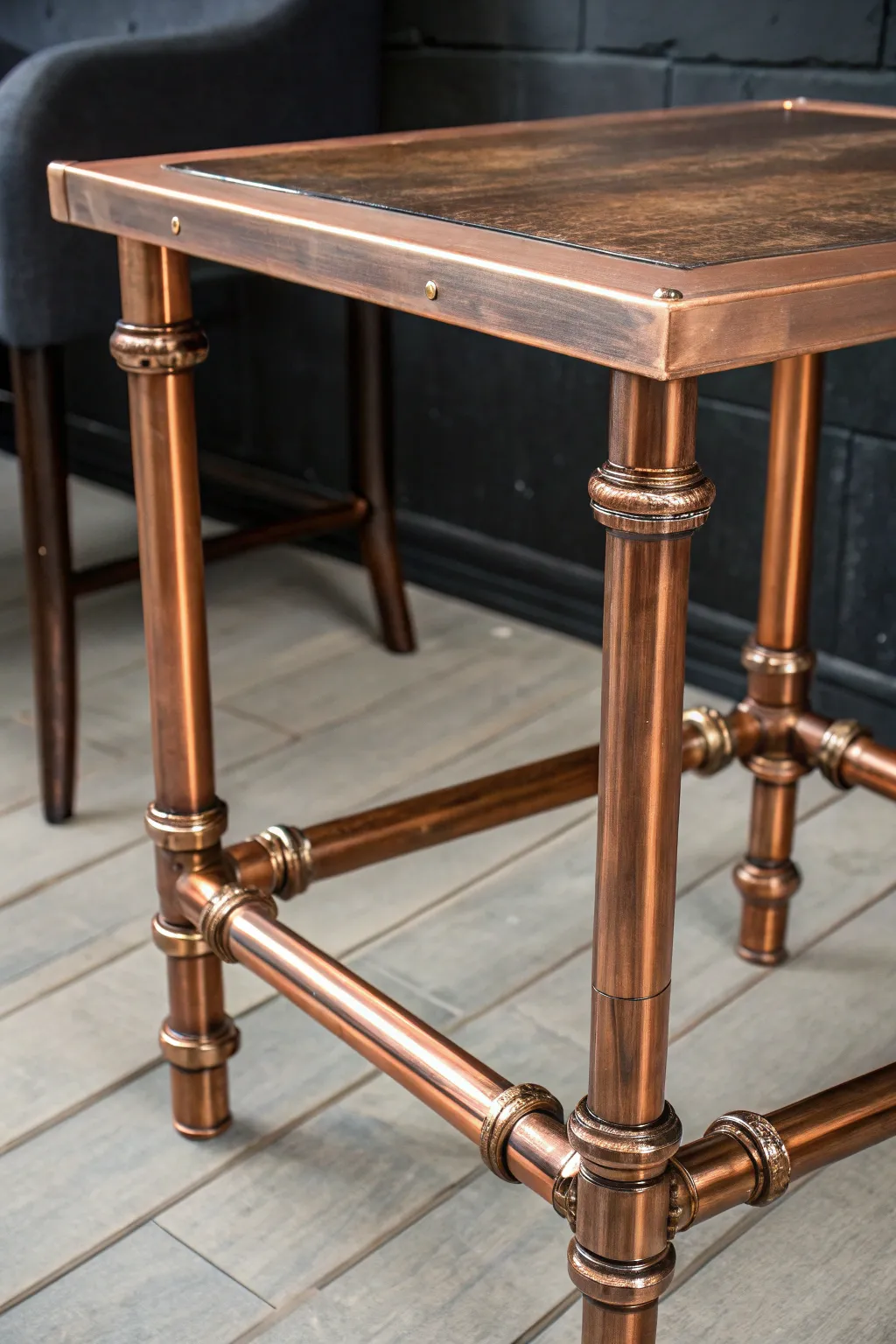Elevate your living space with a handcrafted copper pipe side table that embodies modern elegance.