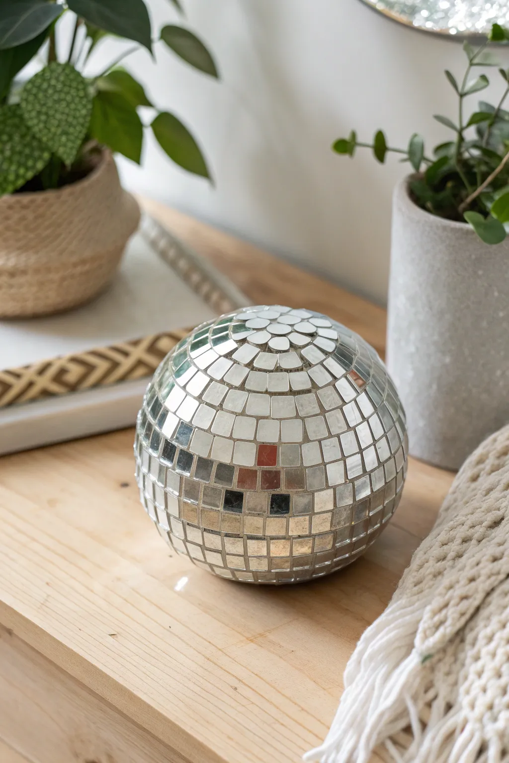 Add a touch of glam to your space with this handcrafted mini mirror tile disco ball—where minimalist meets boho chic.