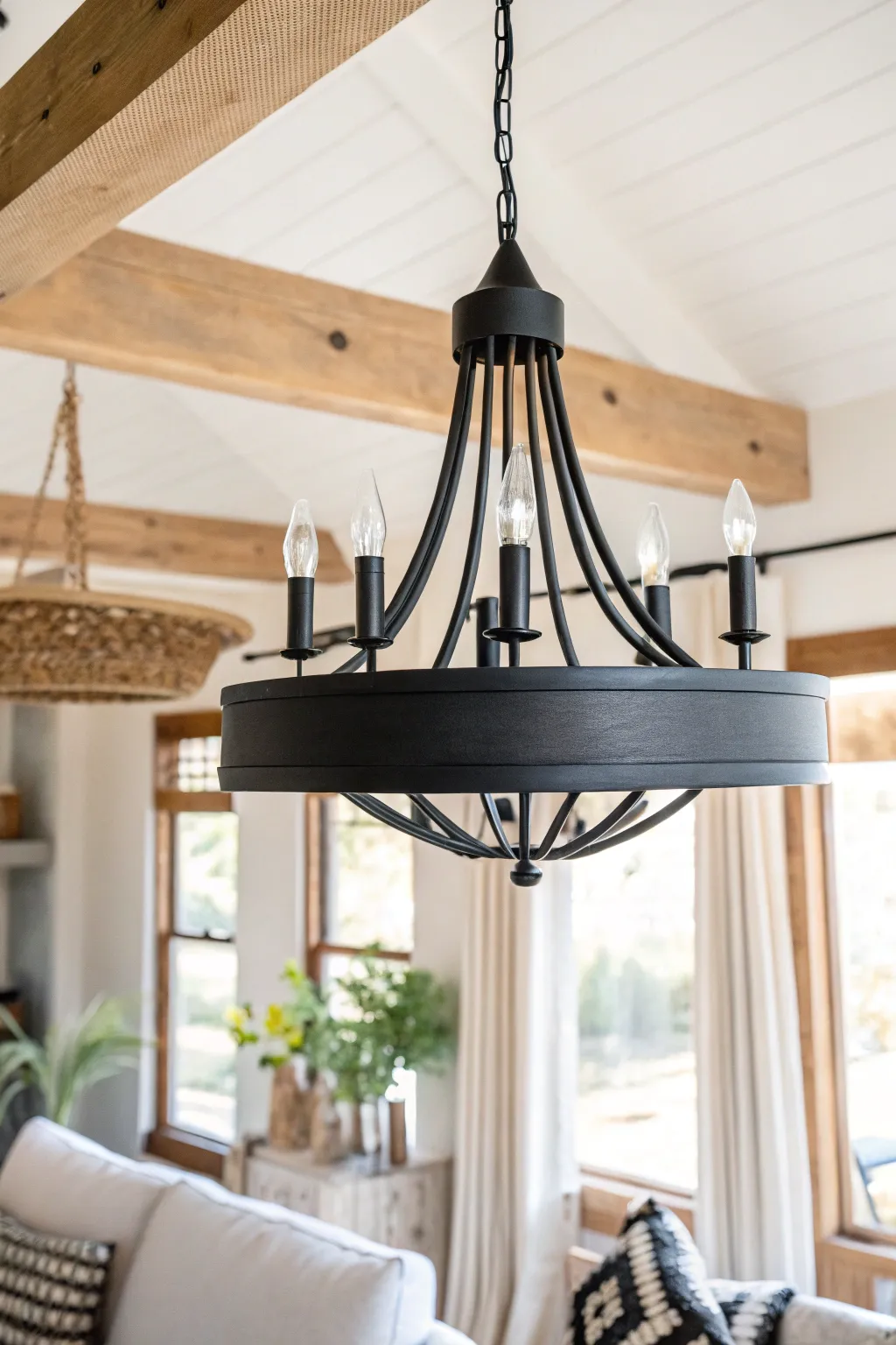 Transform your space with a chic matte black chandelier—where simplicity meets sophistication.