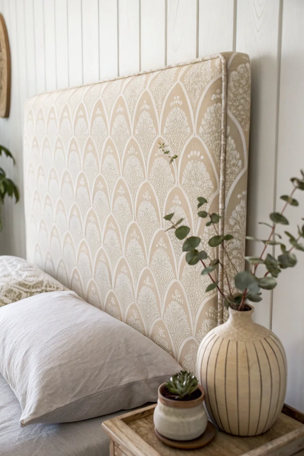 Transform your dorm with a chic fabric-covered headboard, blending minimalism and boho charm effortlessly.