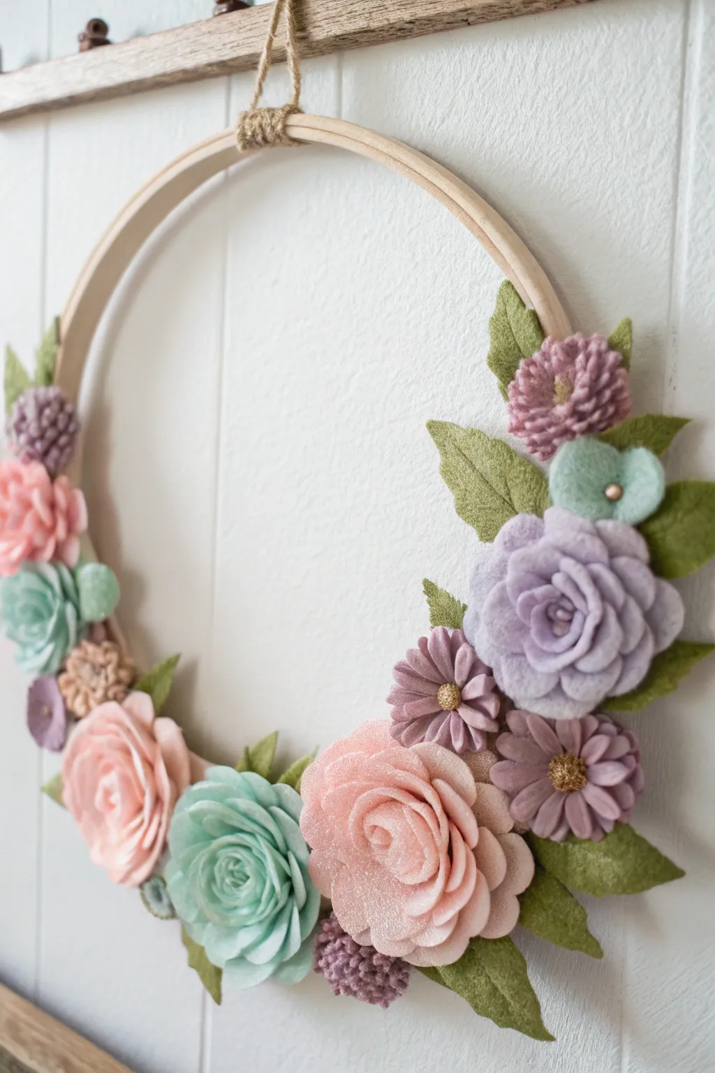 Embrace the beauty of spring with a minimalist, boho-inspired felt flower wreath. Perfect for adding a playful touch to your home!