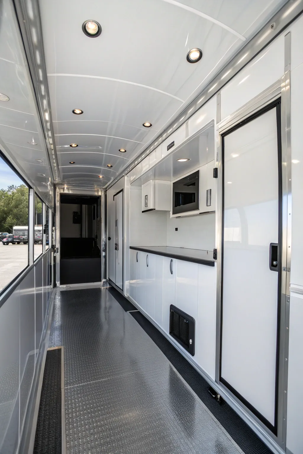 Transform your trailer with glossy white walls for a spacious and stylish upgrade.