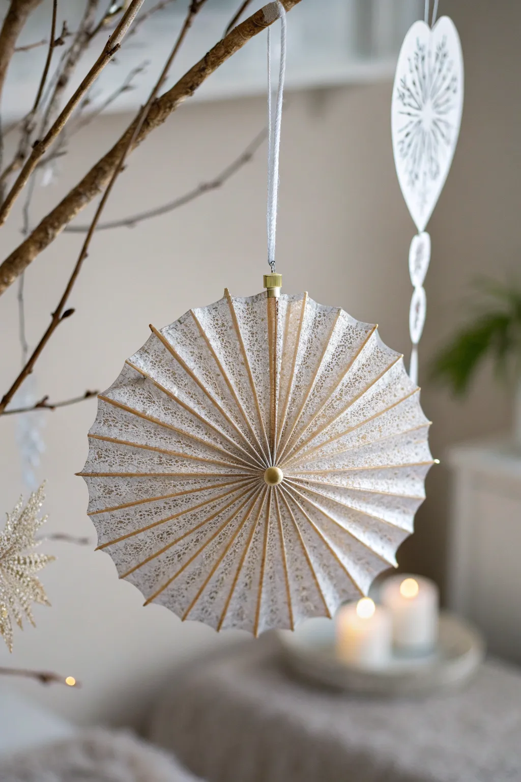 Add a touch of whimsy to your decor with a handcrafted glittery paper umbrella.