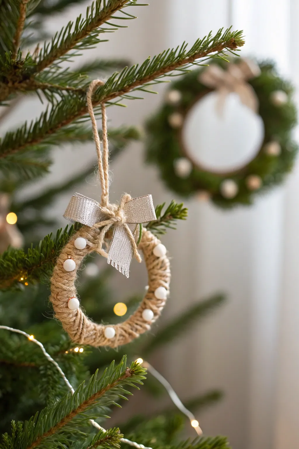 Add a touch of handcrafted elegance to your holiday decor with charming mini wreaths, perfect for a minimalist Christmas tree.
