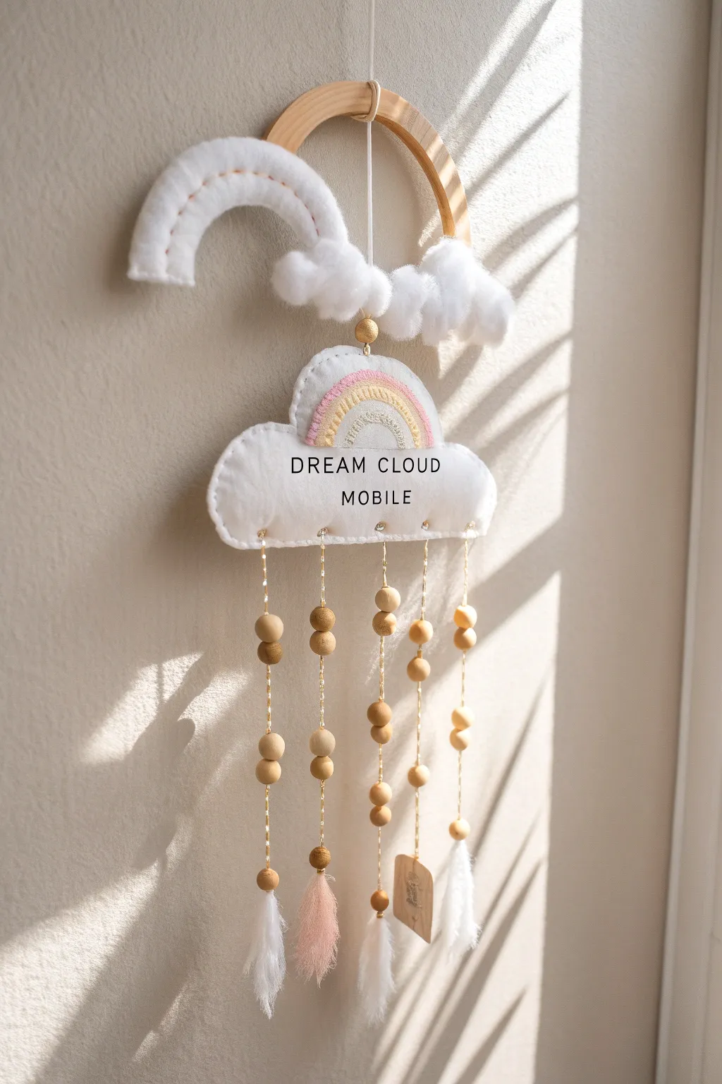 Capture the serenity and inspiration with this Dream Cloud Mobile, a perfect blend of minimalist and Boho elegance, reminding you of the beauty in dreams.