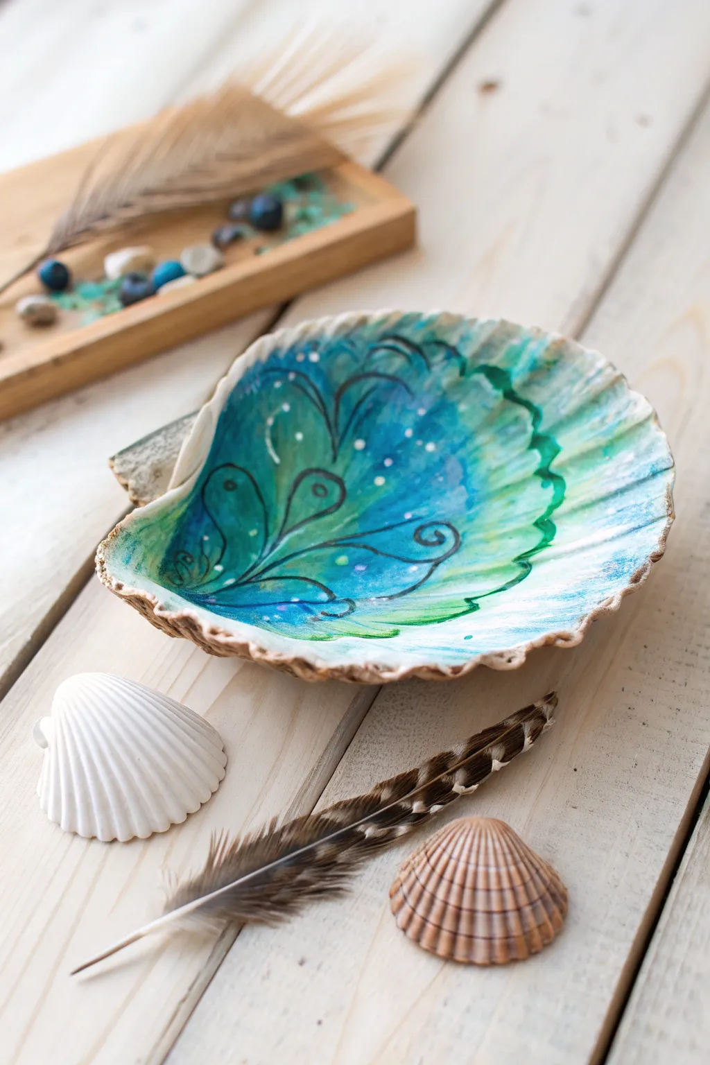 Dive into creativity with these ocean-hued painted oyster shells, perfect for adding a splash of color to your minimalist decor.