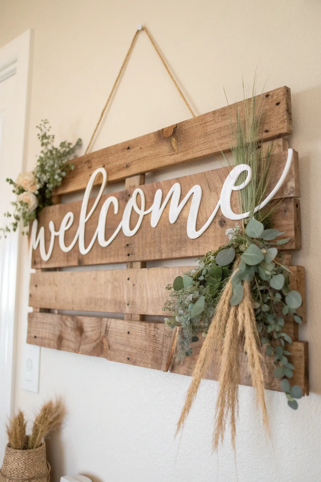 Embrace the warmth of a cozy welcome with this charming pallet wood sign.