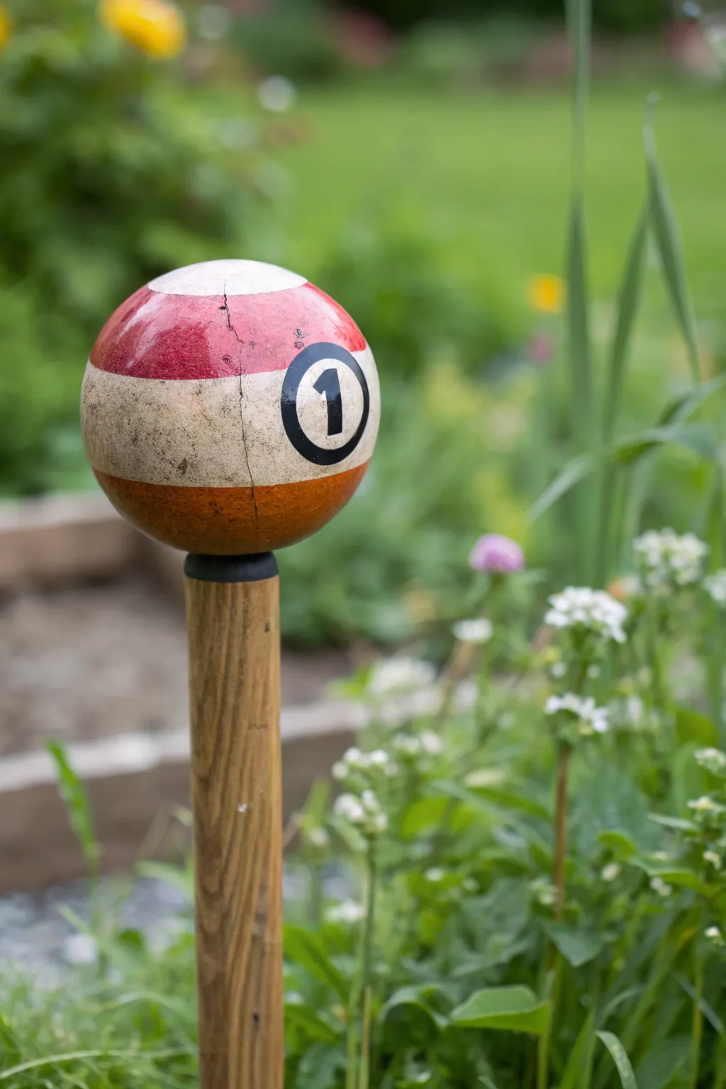 Add a playful touch to your garden with these handcrafted pool ball markers.