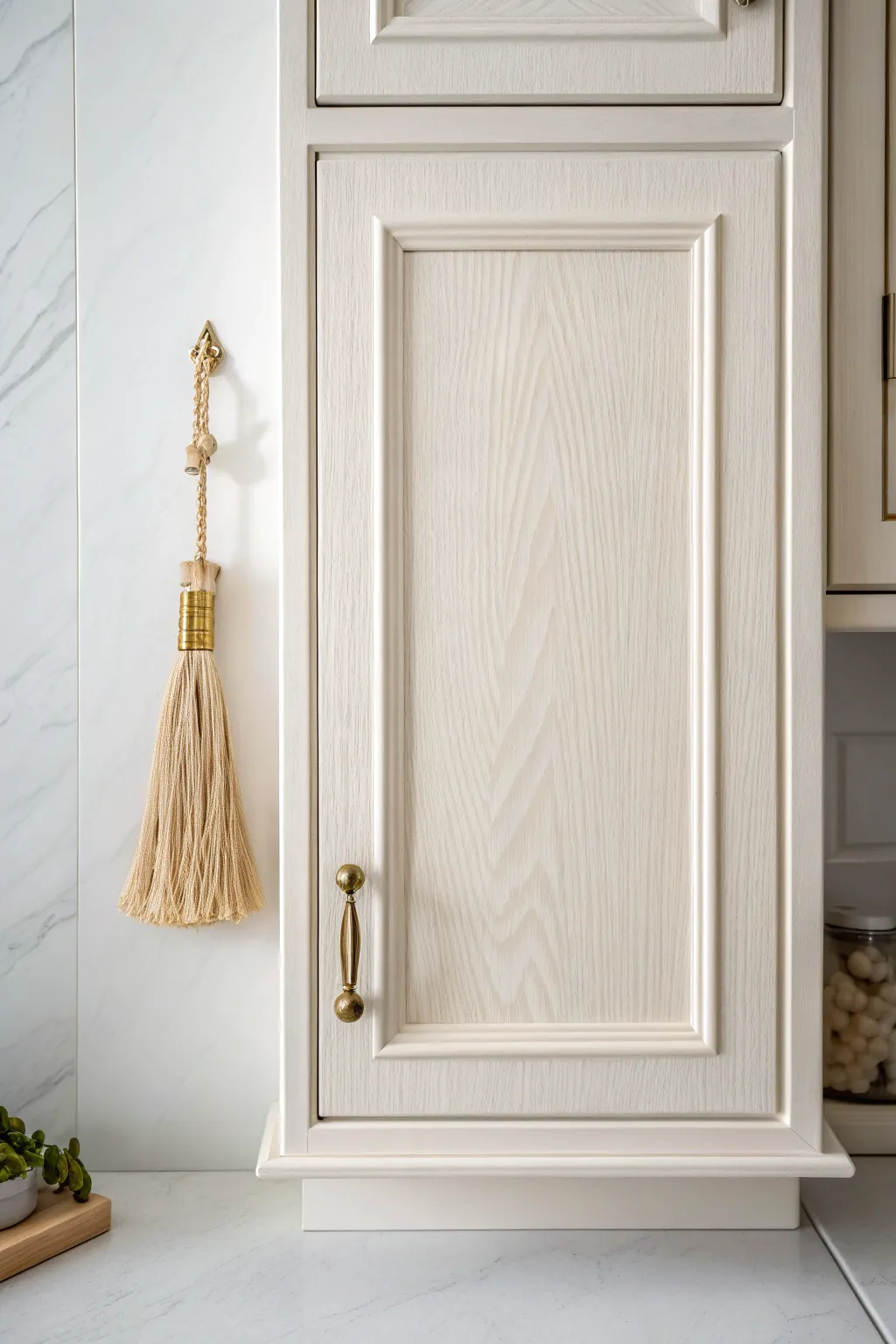Transform your space with the timeless charm of creamy white cabinets.
