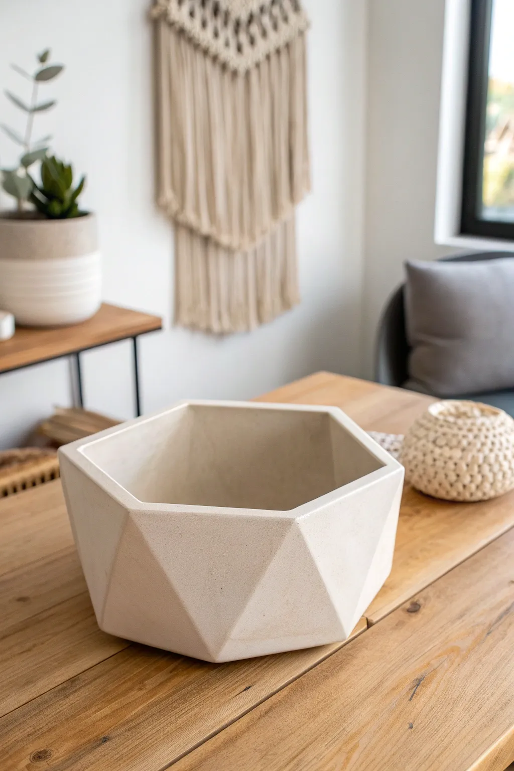 Discover the beauty of geometric elegance with this minimalist hexagonal slab vessel. Perfect for adding a modern touch to any space.
