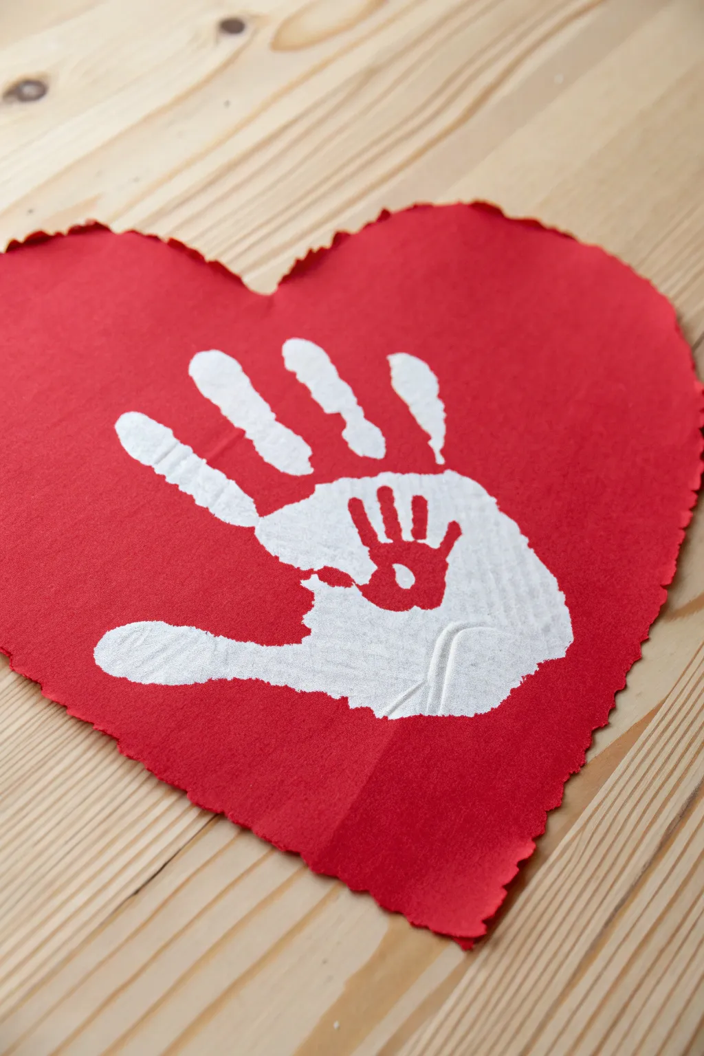 Crafting Love: Heart-shaped handprint cards that capture the warmth of giving.