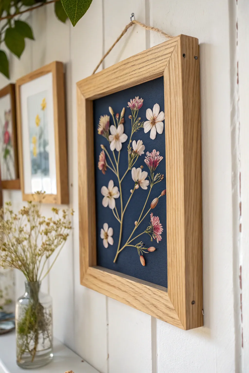 Transform your pressed flowers into elegant wall art with a minimalist touch that sparks conversation.