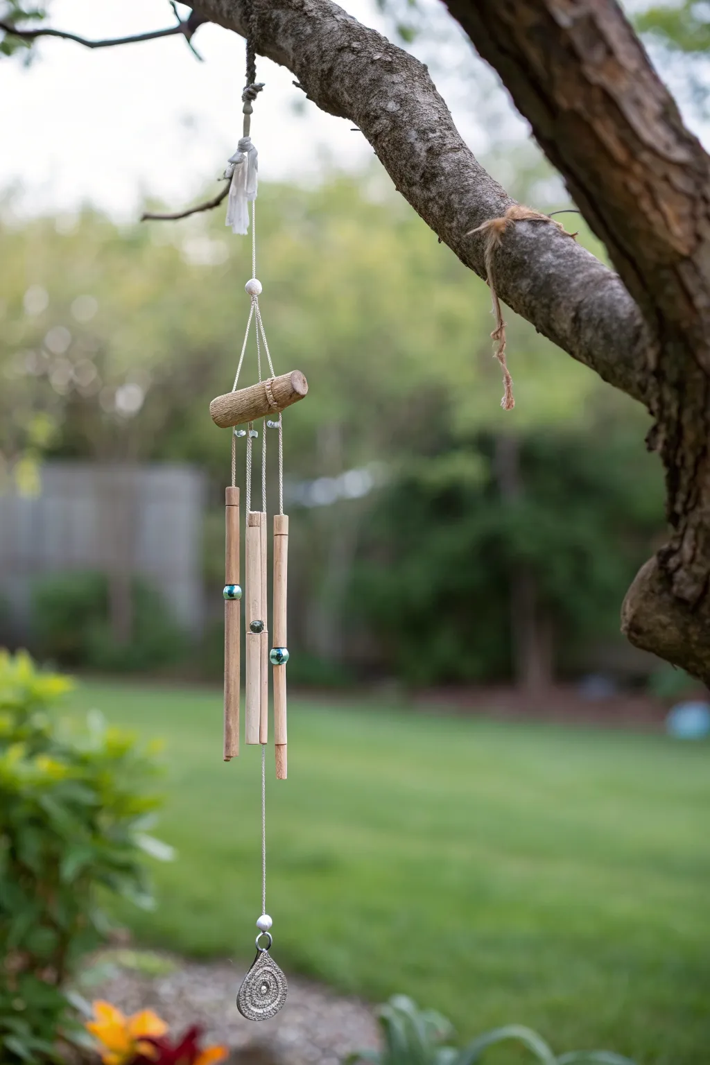 Capturing the essence of simplicity and natural beauty with this enchanting wind chime display.