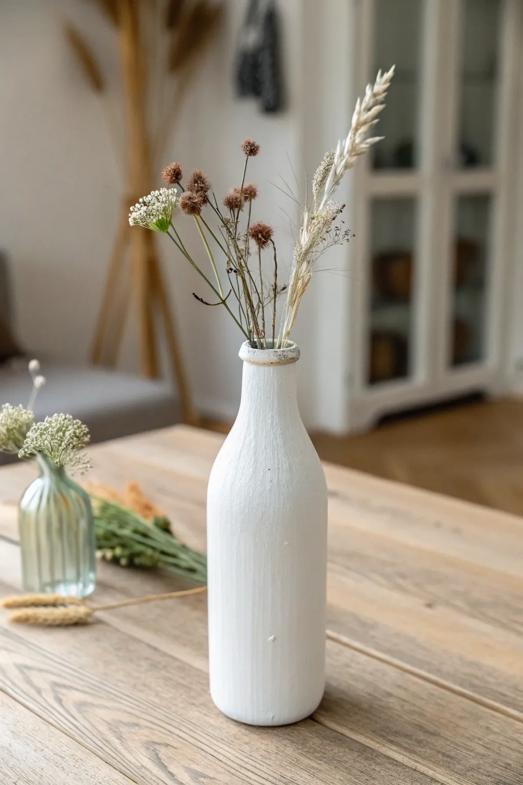 Elevate your space with a touch of creativity: upcycled bottle vases for a minimalist, Boho vibe.