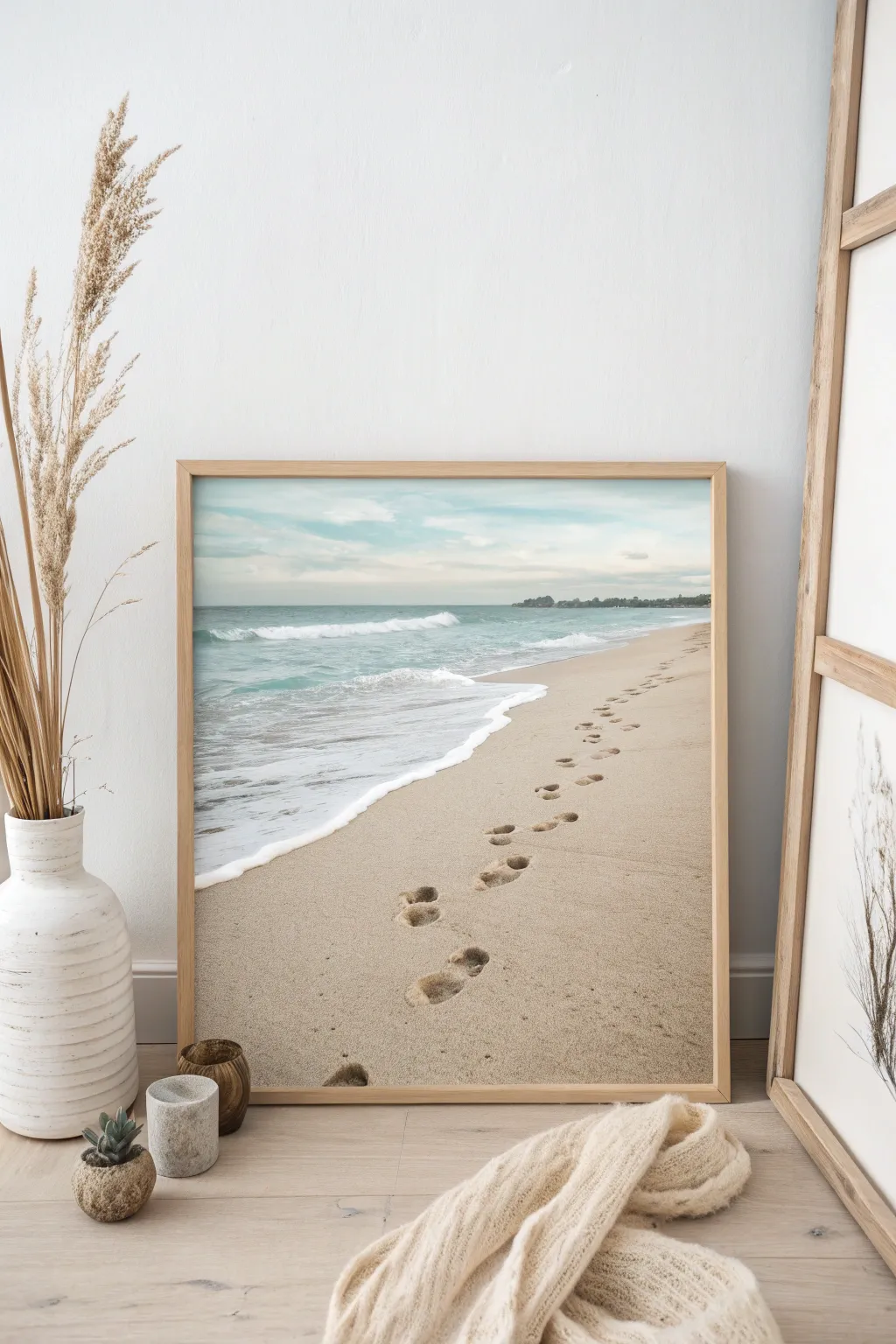 Embrace simplicity and storytelling with footprints leading to the sea.