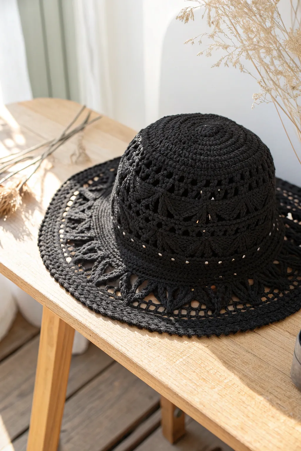 Wrap yourself in warmth and style with this chic black crochet hat, your perfect winter companion.