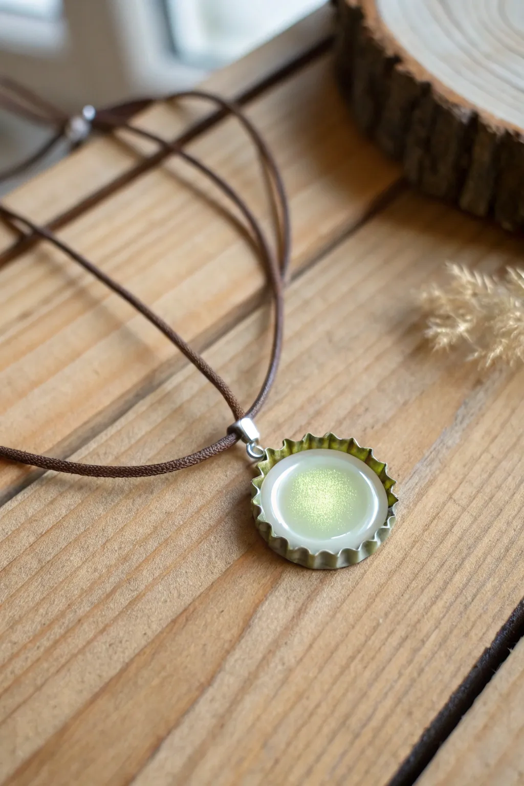 Illuminate your style with this glow-in-the-dark bottle cap pendant, where Scandinavian minimalism meets Boho charm.
