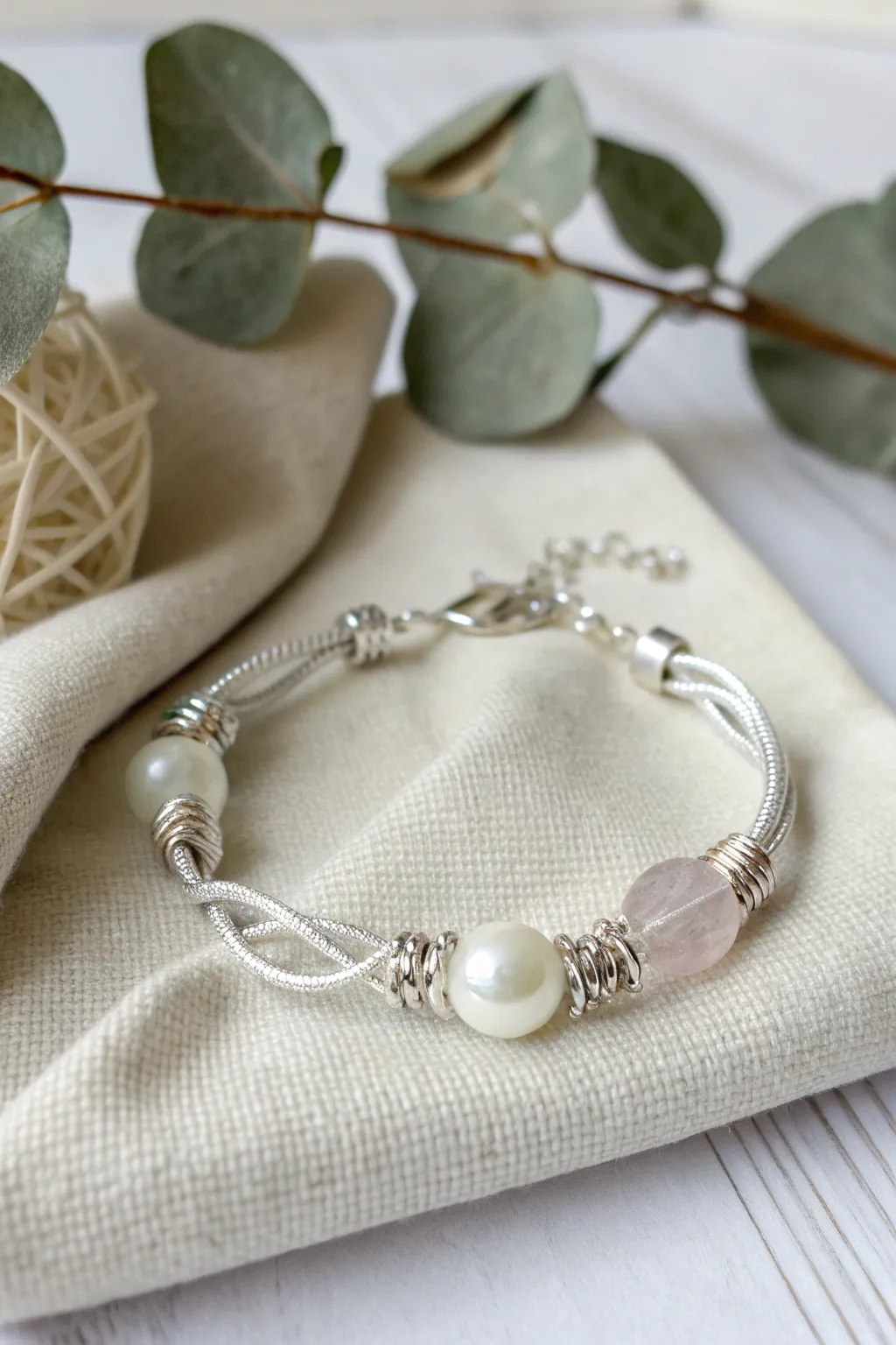 Discover the elegance of wire-wrapped artistry with this sophisticated bracelet.