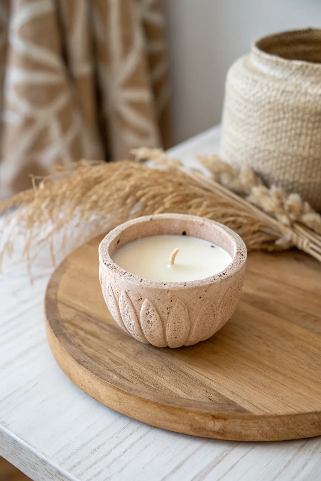 Embrace the warmth of handcrafted beauty with this elegant clay candle holder.
