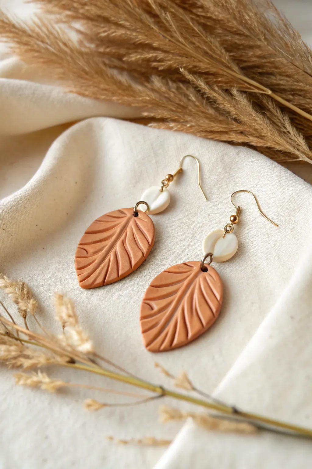 Wearable Art: Elevate your style with handcrafted clay earrings that embody simplicity and natural beauty.