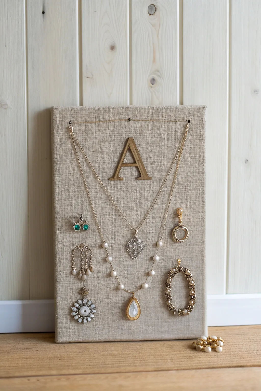 Transform vintage jewelry into timeless art with a stunning collage centerpiece.
