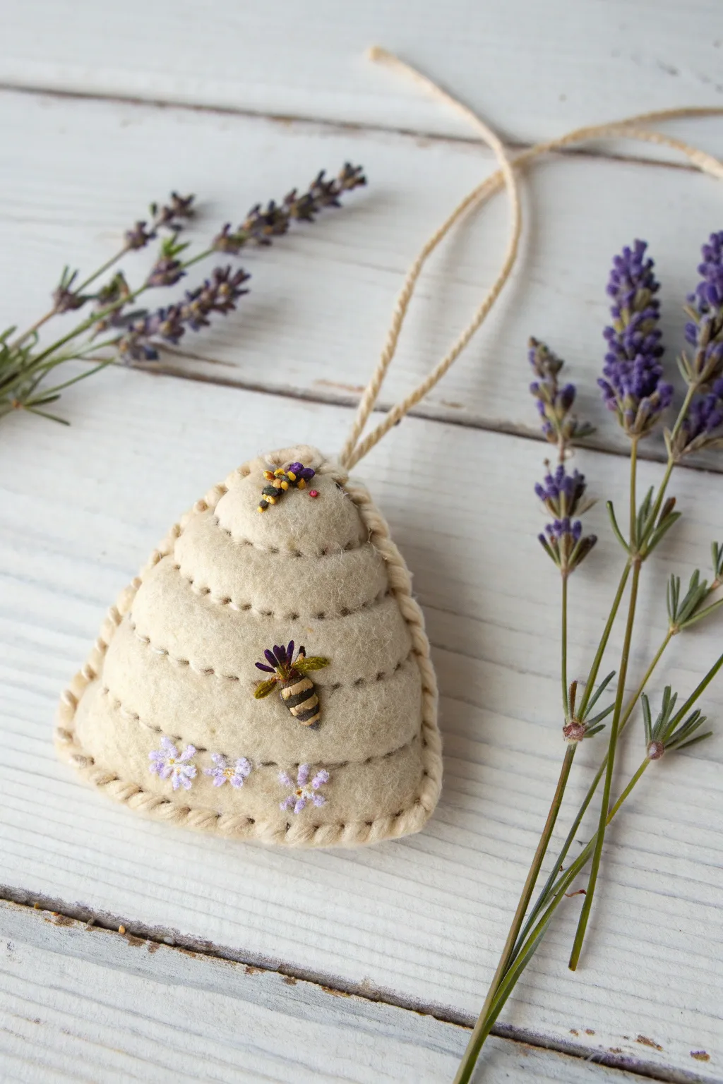 Capture the essence of nature and craftsmanship with this charming DIY mini beehive ornament, perfect for adding a touch of freshness and style to your space.