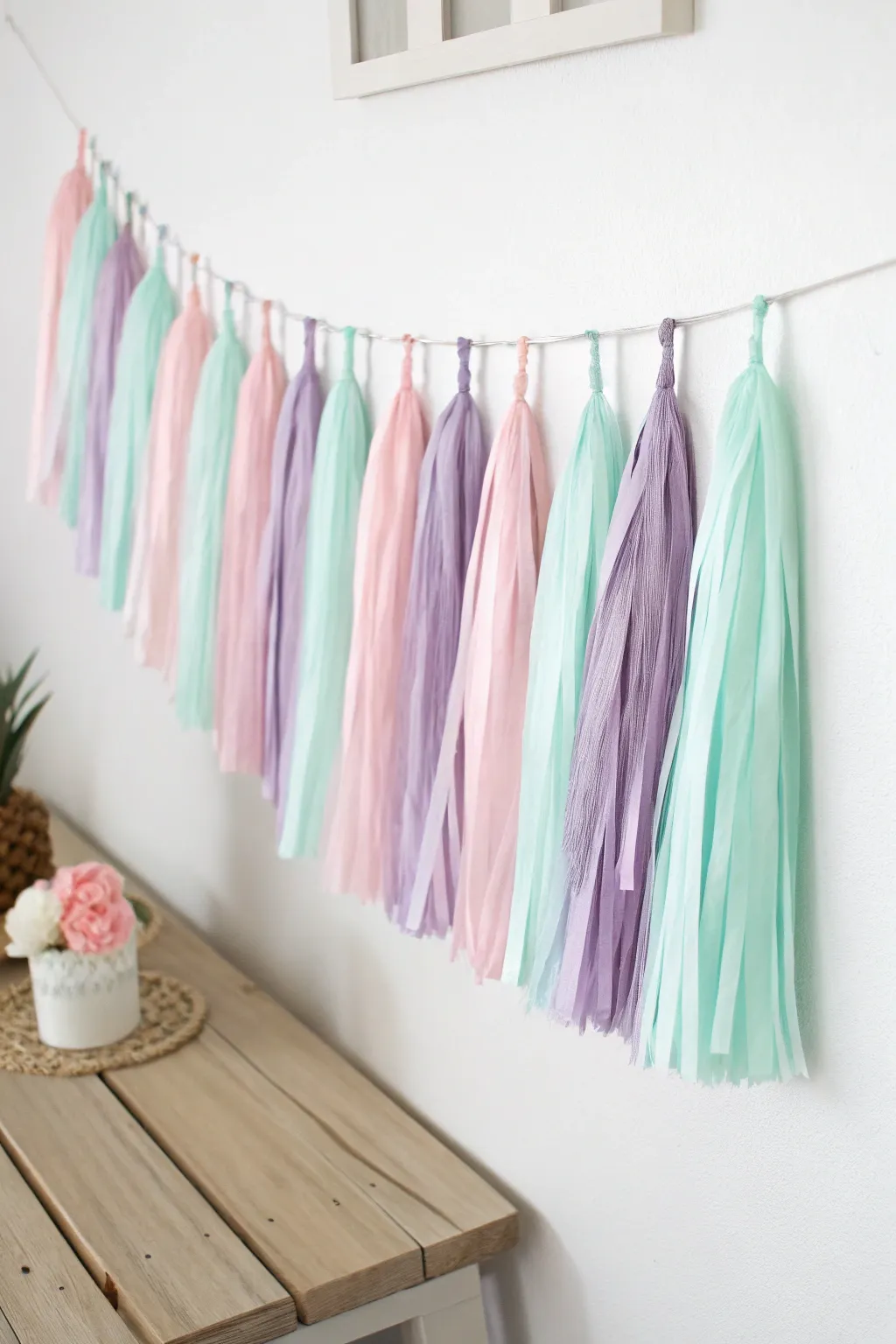 Add a touch of whimsy and elegance to your celebration with a DIY tassel garland. Perfect for creating a dreamy, minimalist atmosphere!