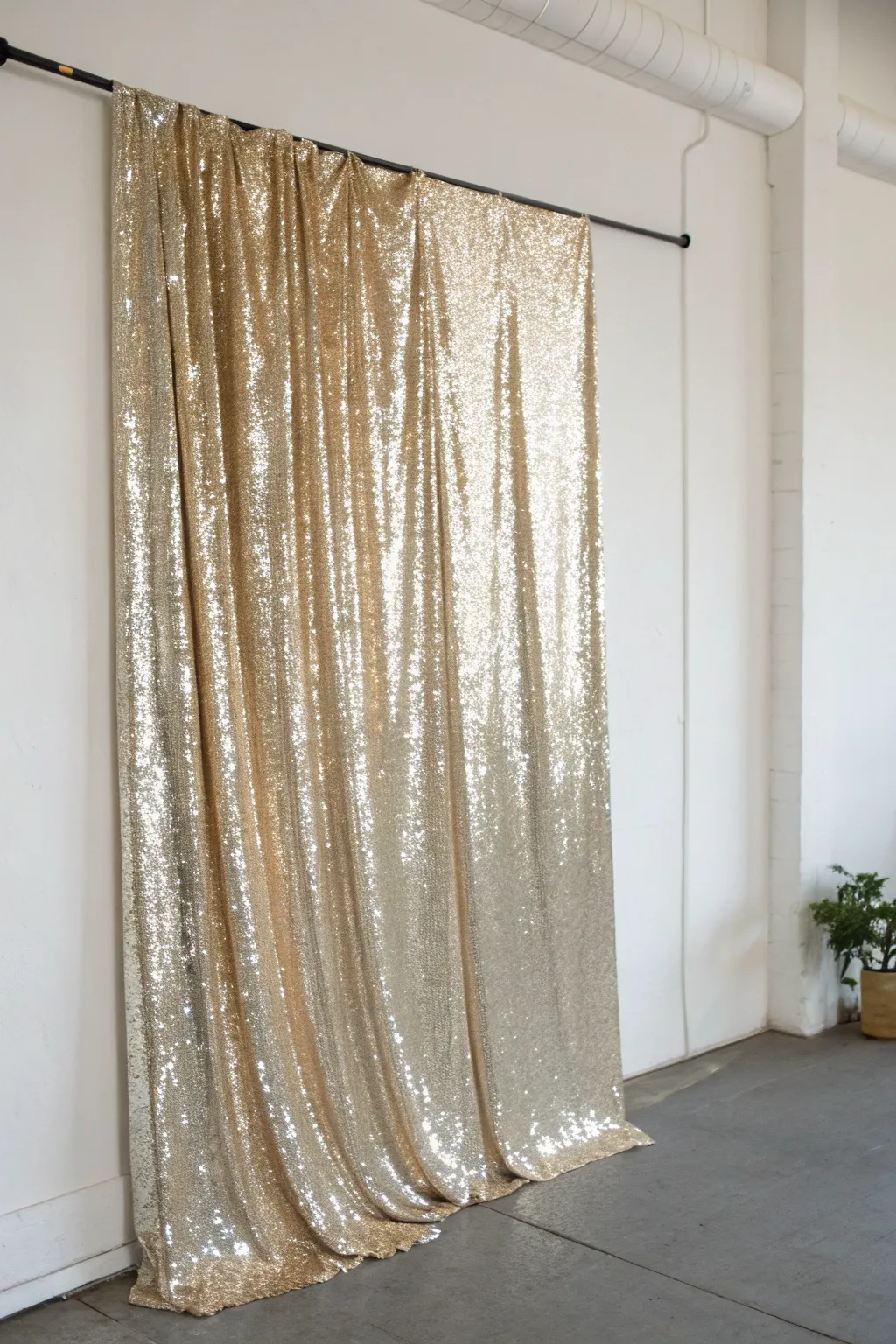 Transform any space into a shimmering masterpiece with this minimalist sequin backdrop.