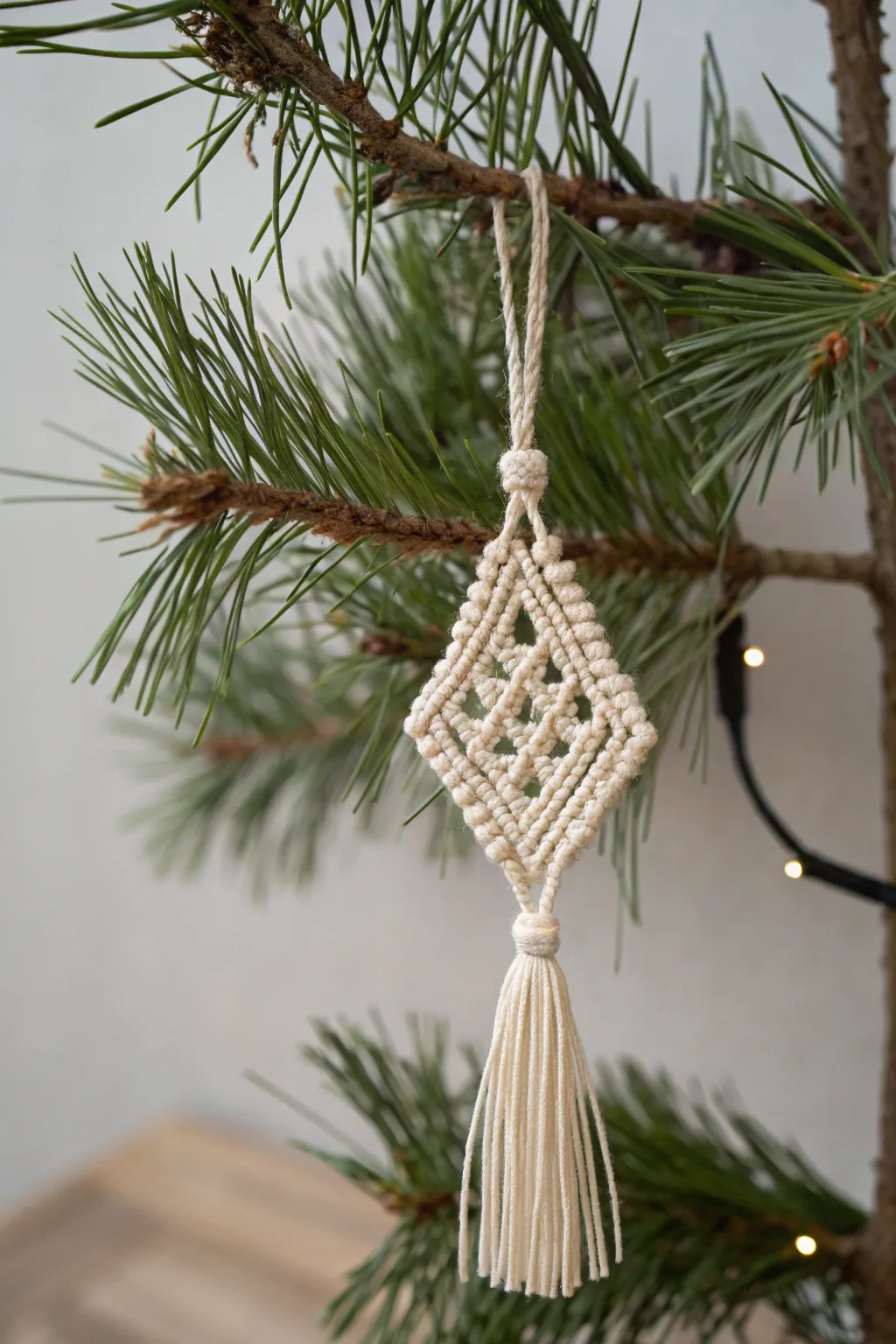Transform your holiday decor with the simple elegance of handcrafted macramé ornaments. A touch of boho beauty for your minimalist space.
