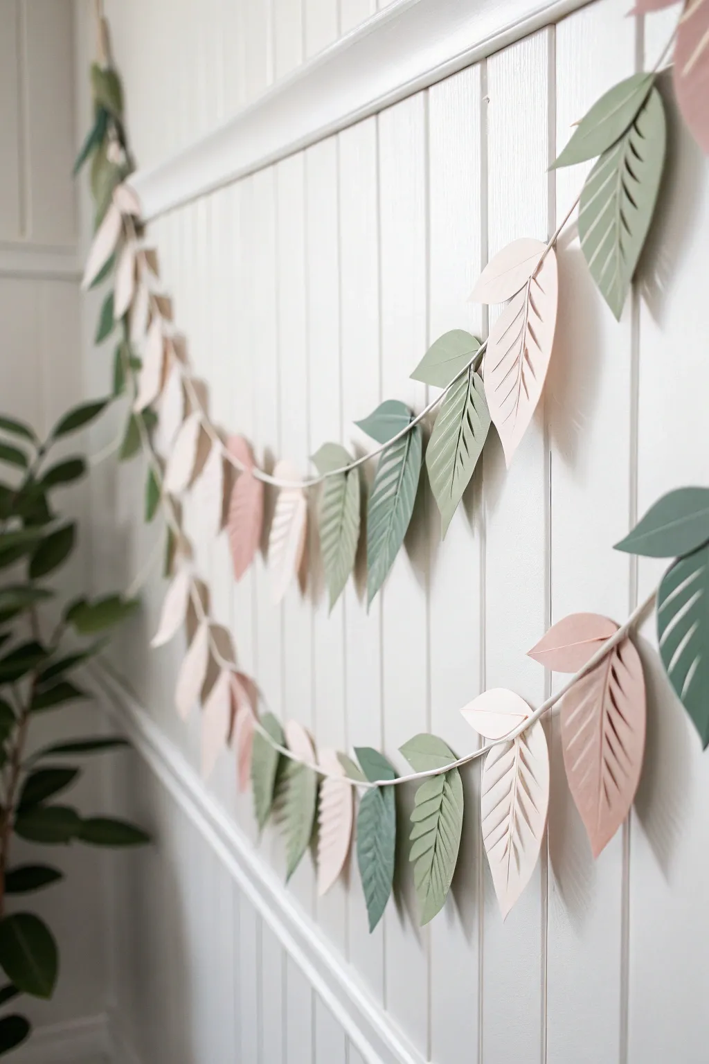 Transform your space with a touch of nature using this elegant leafy paper garland, perfect for minimalist and boho-inspired interiors.