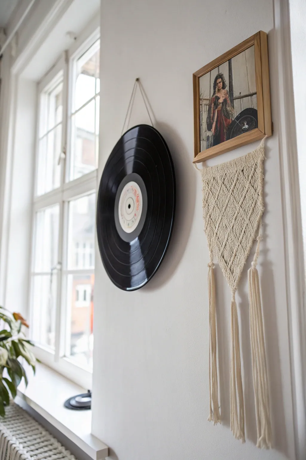 Elevate your space with the timeless charm of hanging vinyl records. 🎶✨