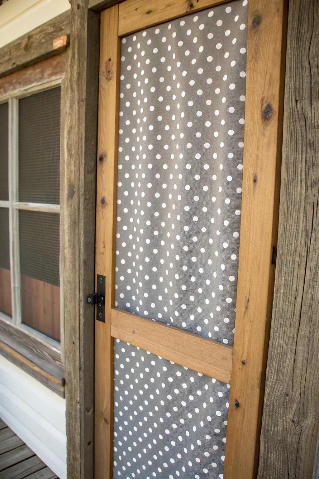 Elevate your entryway with a touch of whimsy using a patterned fabric screen door.