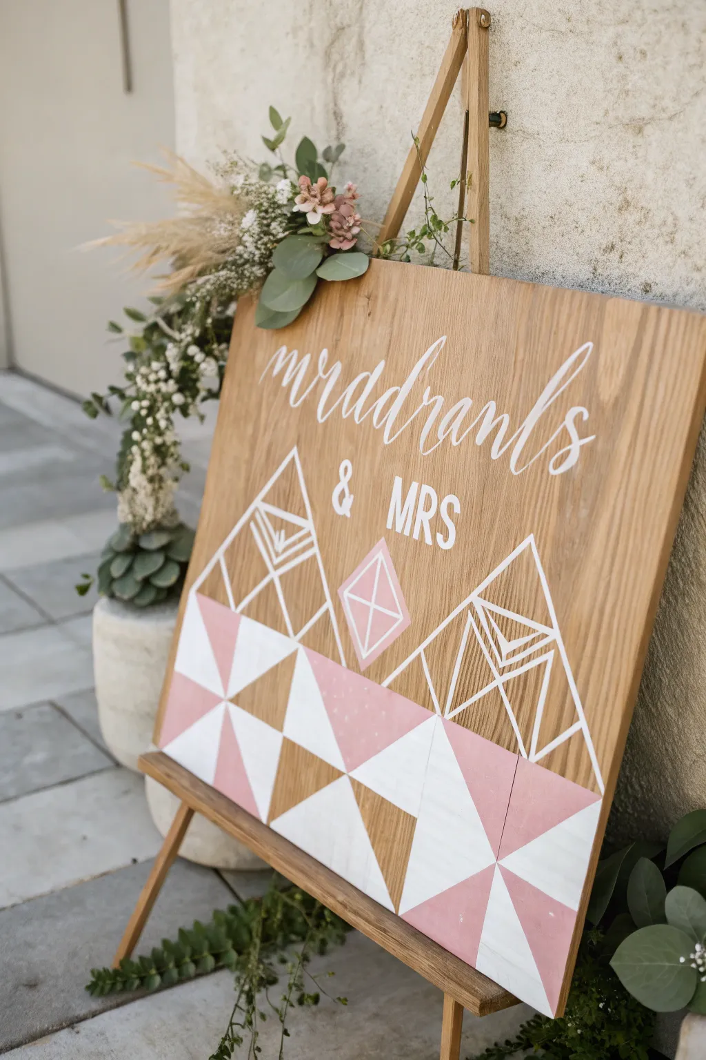 Elevate your wedding decor with handcrafted geometric signage that marries modern design with natural beauty.