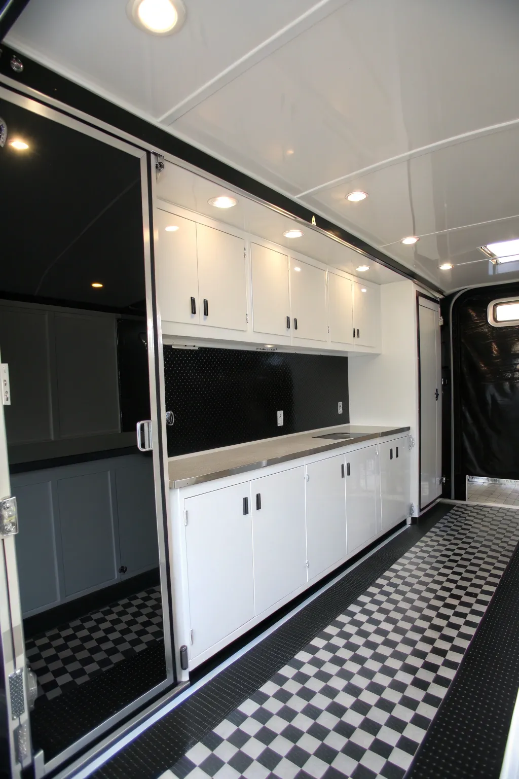 Elevate your trailer's interior with the timeless elegance of a black and white theme, where classic style meets modern craftsmanship.