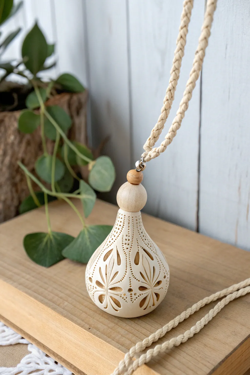 Wear nature’s elegance with this intricately carved gourd pendant, perfect for the minimalist boho soul.