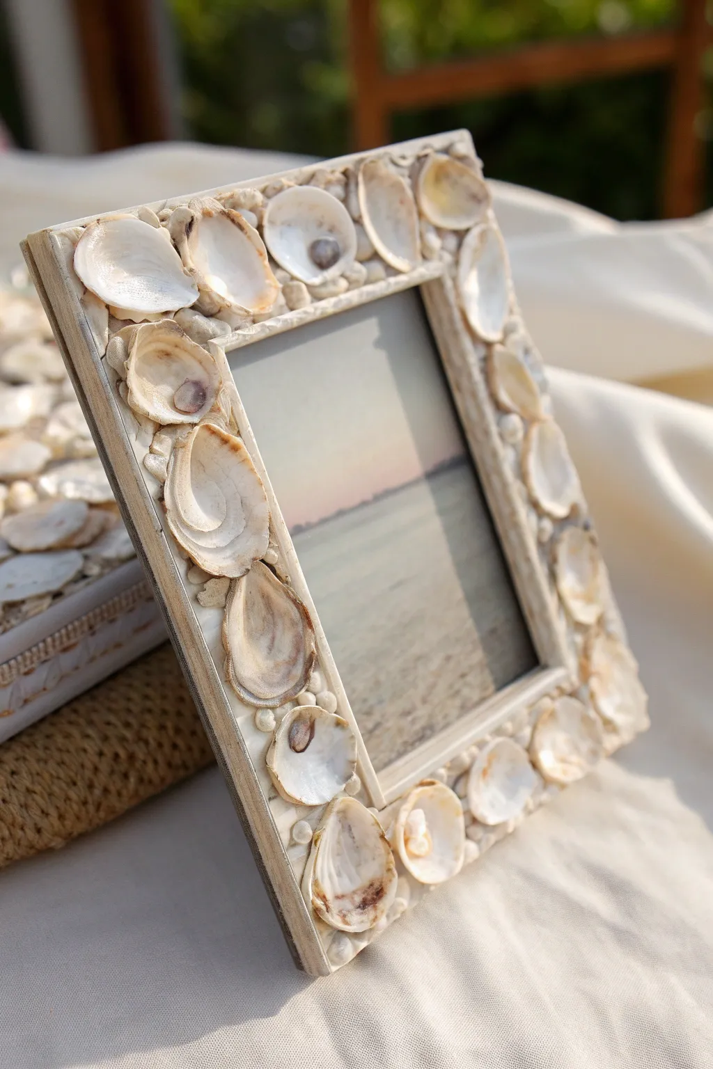 Embrace coastal elegance with this handcrafted oyster shell photo frame, perfect for preserving your cherished memories.
