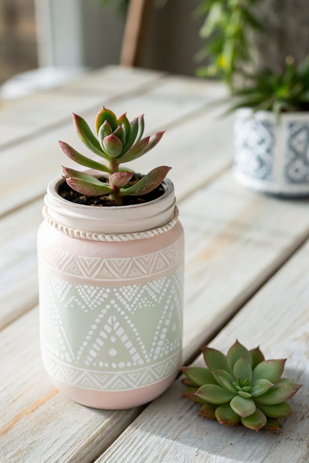 Transform your mason jars into charming planters with a touch of paint and creativity.