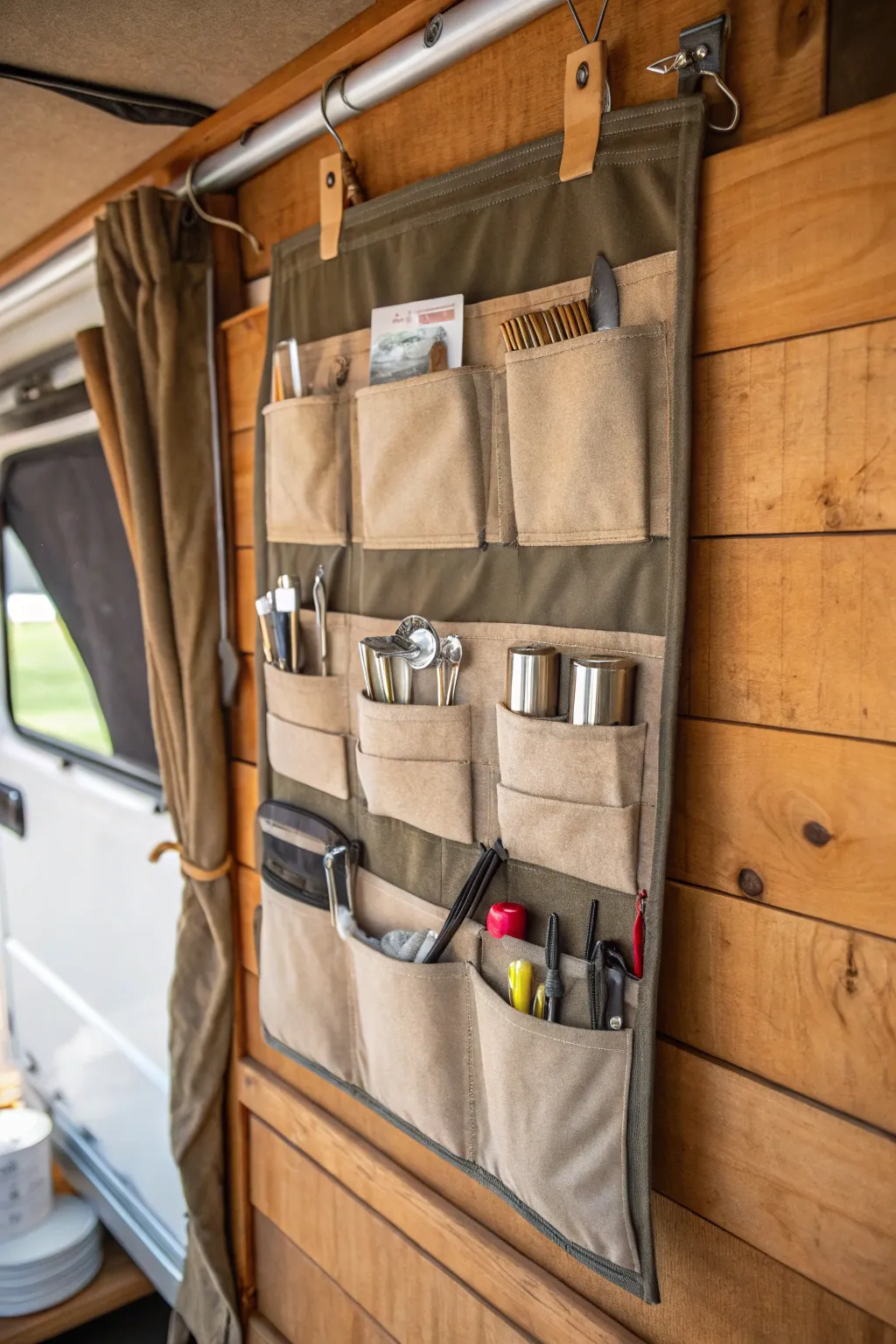 Elevate your camper organization with a crafty hanging shoe organizer solution.