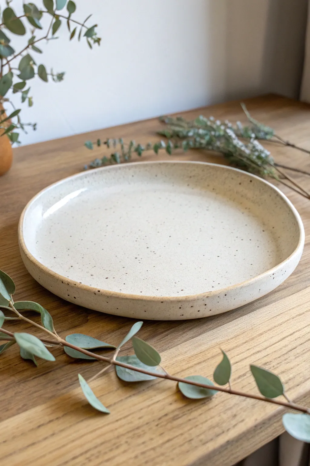 Embrace simplicity with a minimalist pottery platter that speaks volumes.