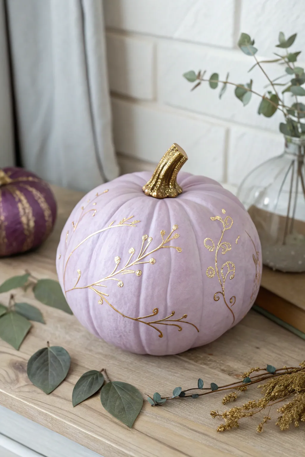 Transform your autumn decor with a touch of elegance: Purple pumpkin with metallic accents.