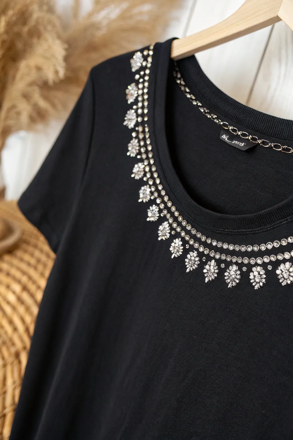 Transform your wardrobe with a touch of sparkle: Rhinestone necklines for effortless elegance.