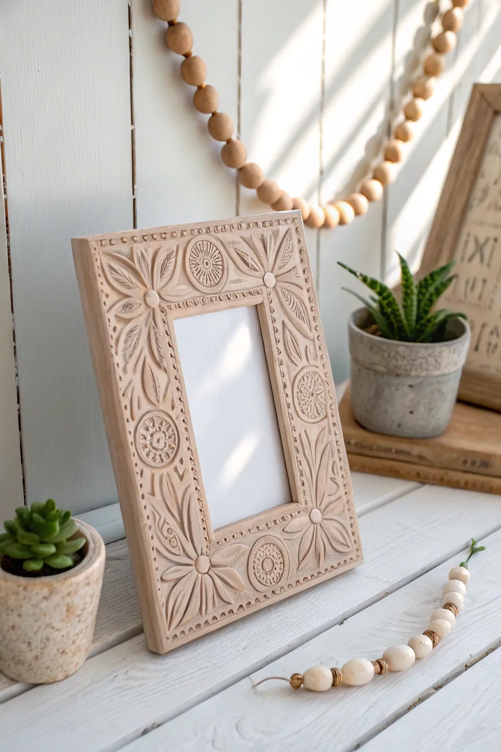 Capture cherished moments in handcrafted elegance with this Scandinavian-inspired clay picture frame.