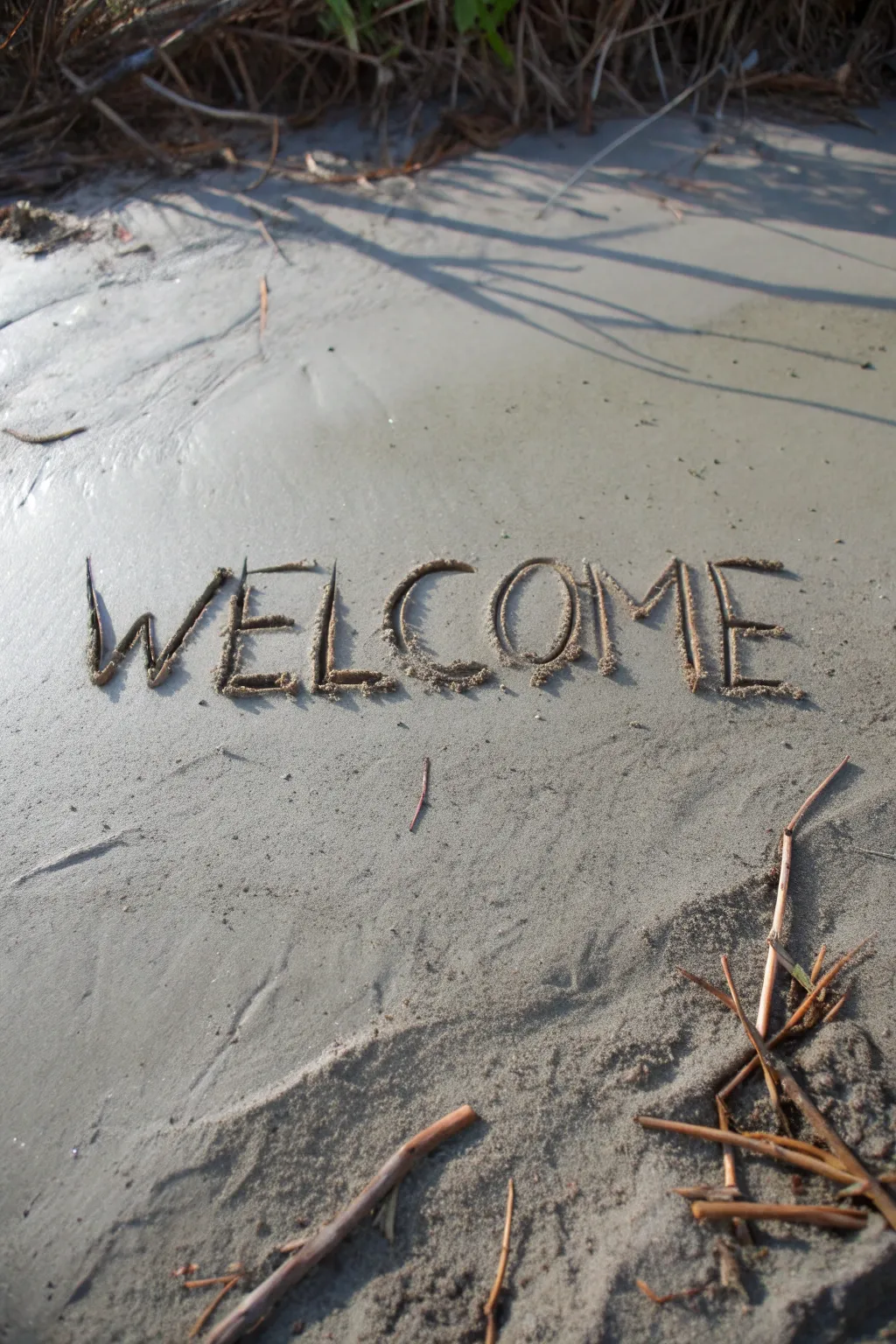 Craft your own rustic charm with twig lettering in wet cement.