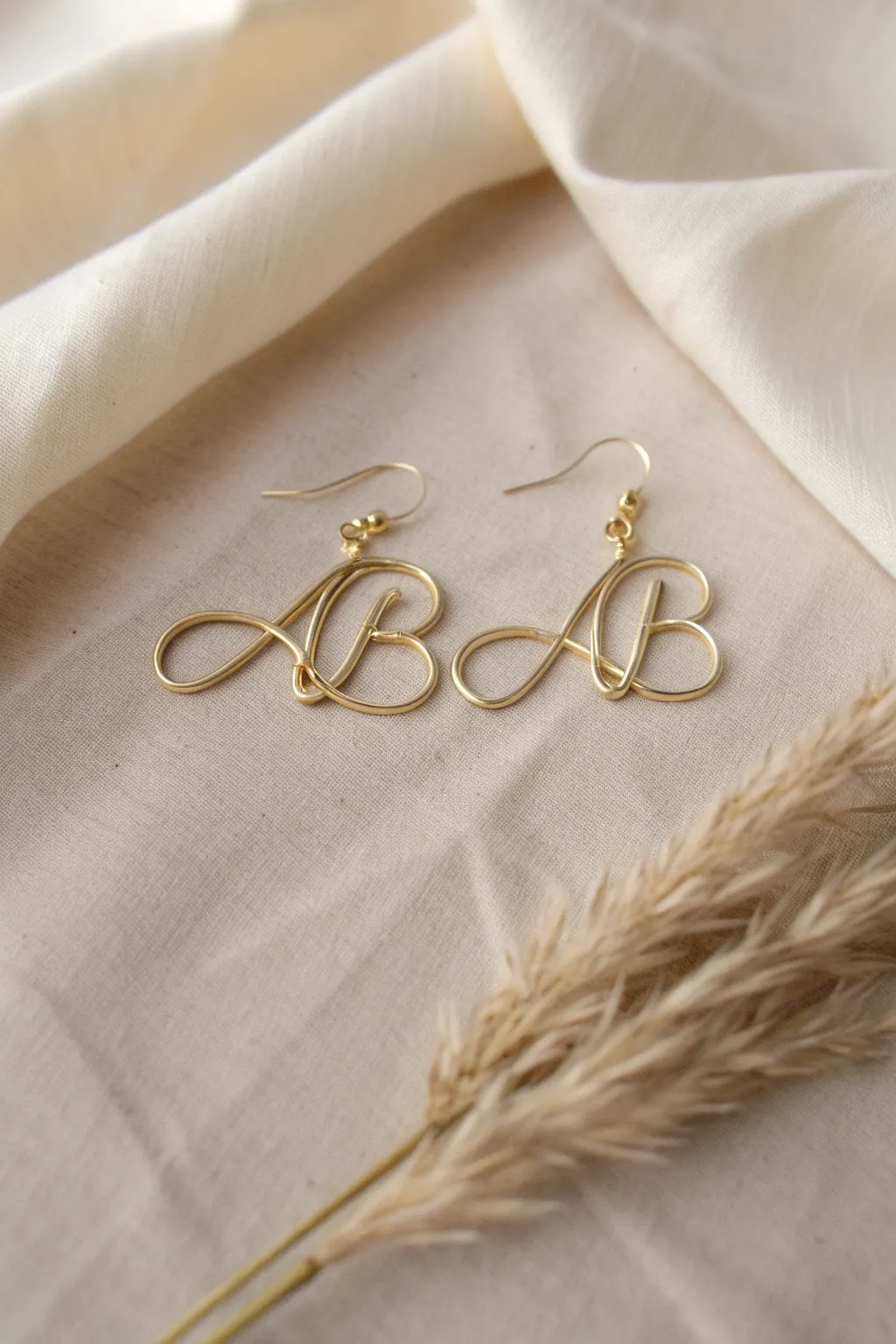 Crafted with love: Personalized wire initial earrings that speak volumes in simplicity and elegance.