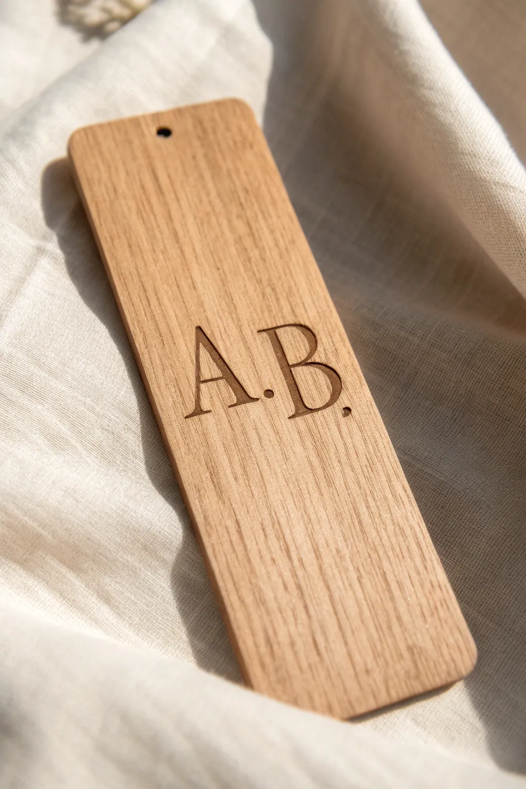 Personalized elegance: Monogrammed wooden bookmarks for a touch of individuality.