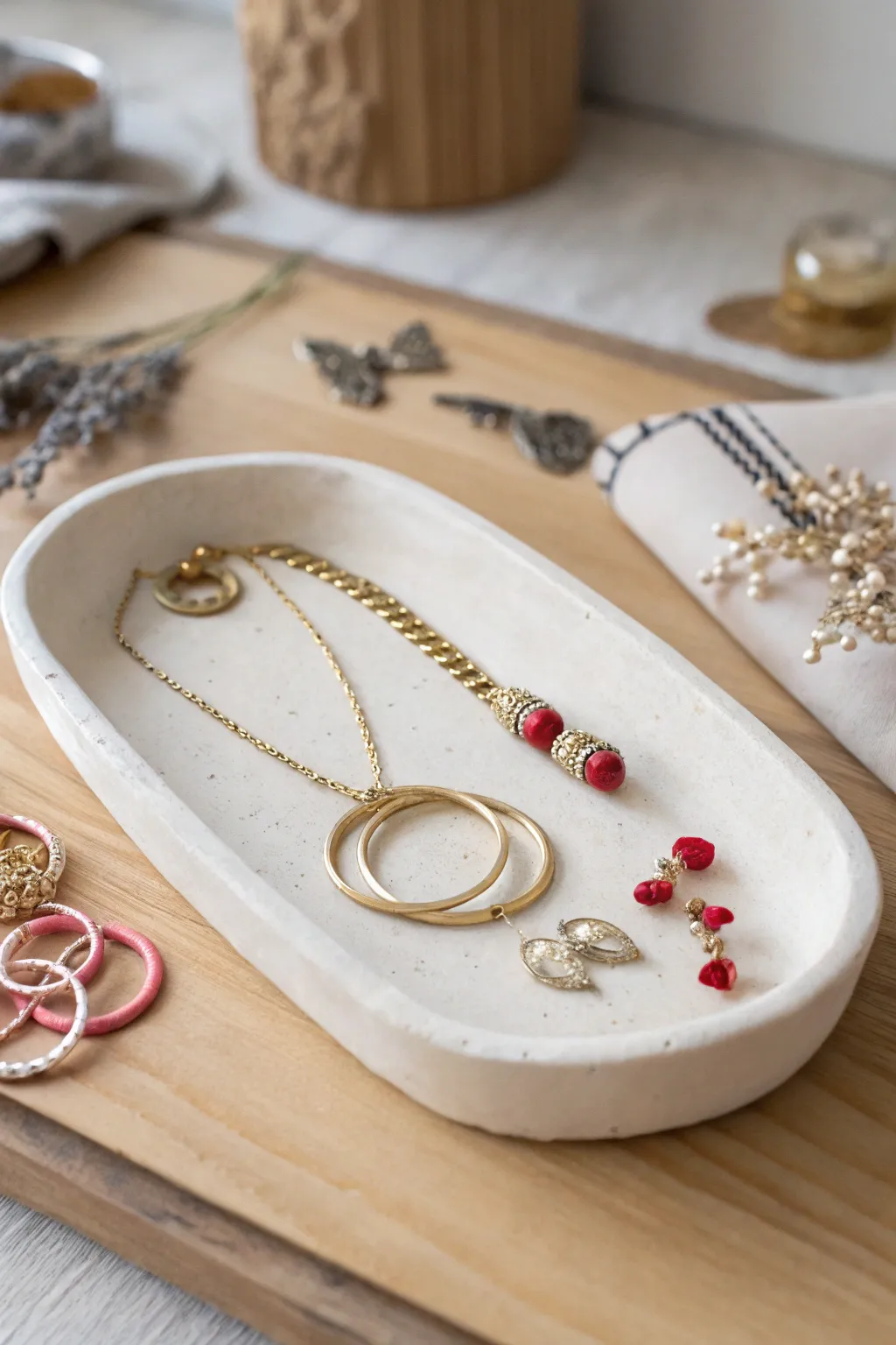 Elevate your accessory organization with a bespoke clay jewelry tray, where Scandinavian minimalism meets Boho charm.