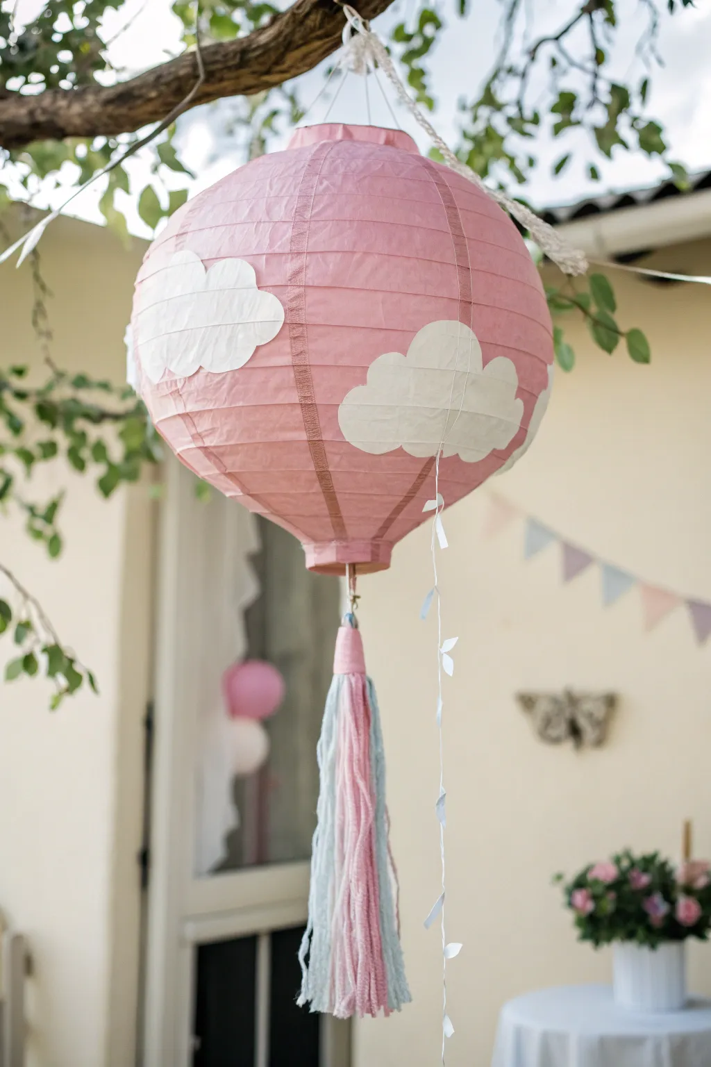Elevate your pinata game with dreamy paper clouds for a whimsical touch.