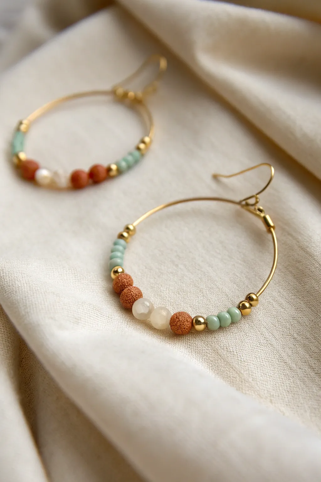Embrace chic versatility with these handcrafted beaded creole earrings; where minimalist design meets boho charm.