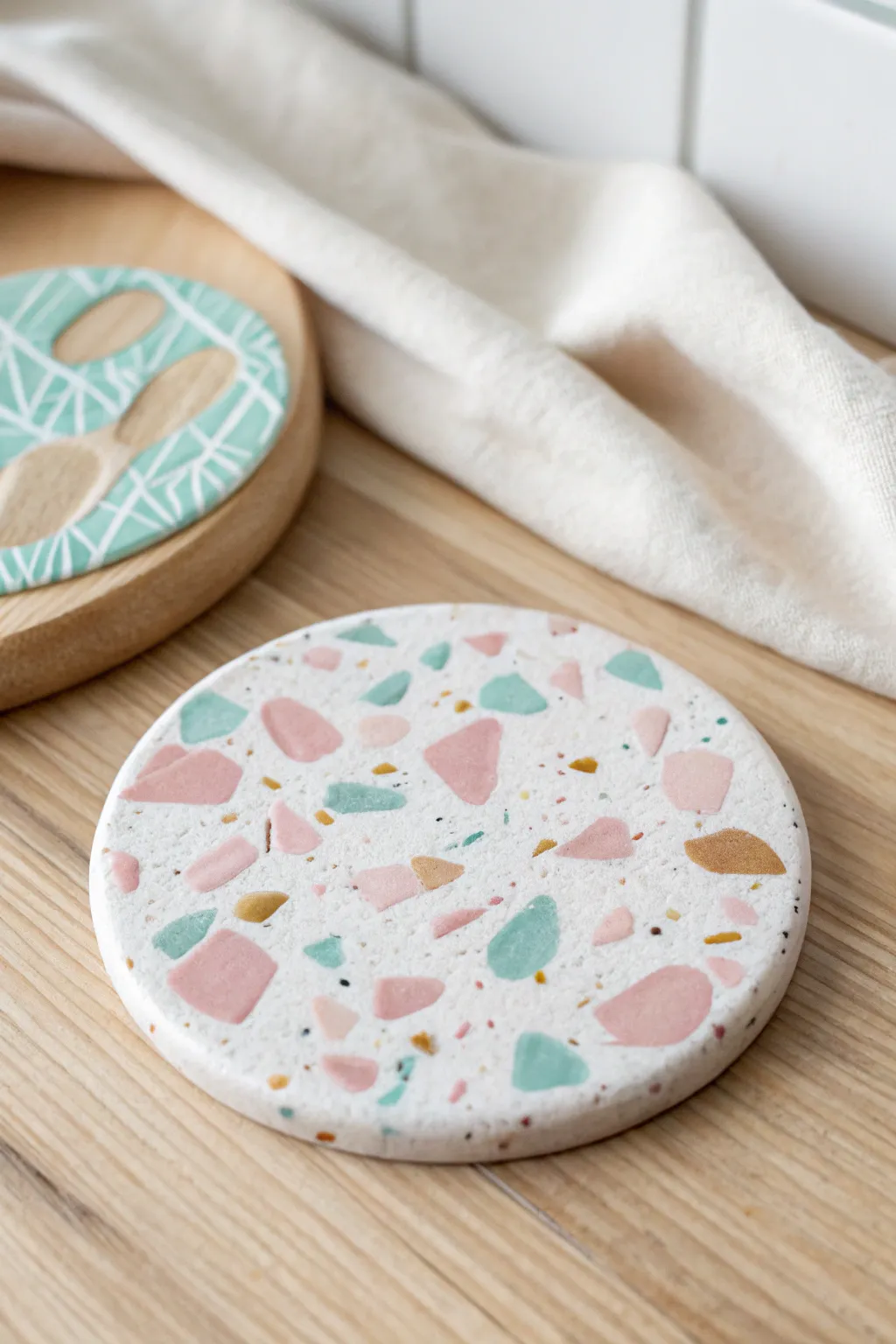 Elevate your table with handcrafted terrazzo clay coasters that blend style and function seamlessly.